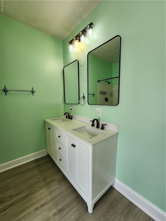 110 S Willard Ave, Hampton, VA 23663 - bathroom with wood finished floors and double vanity