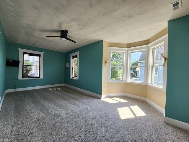 110 S Willard Ave, Hampton, VA 23663 - carpeted empty room featuring baseboards and a ceiling fan