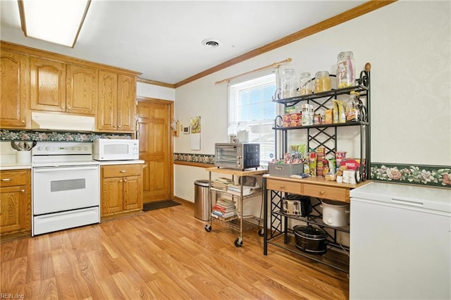 236 Haledon Rd, Chesapeake, VA 23320 - kitchen featuring white appliances, under cabinet range hood, crown molding, light wood-style flooring, and brown cabinetry