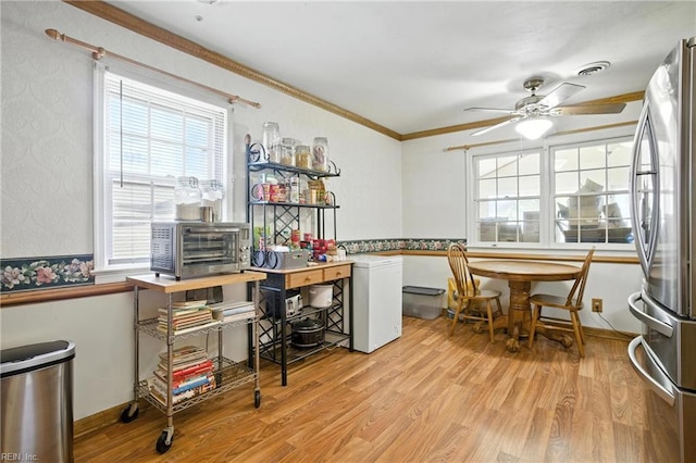 236 Haledon Rd, Chesapeake, VA 23320 - home office with light wood-style floors, a ceiling fan, crown molding, plenty of natural light, and a textured wall