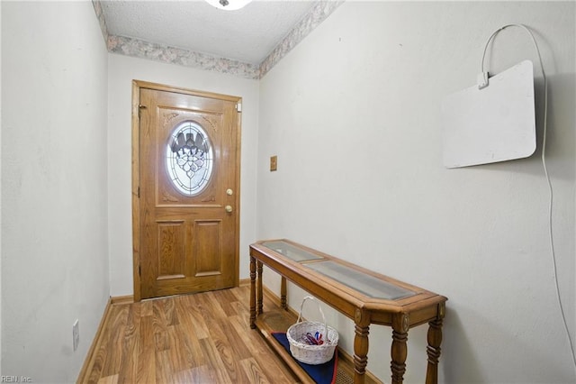 236 Haledon Rd, Chesapeake, VA 23320 - entryway featuring light wood-style flooring and a textured ceiling