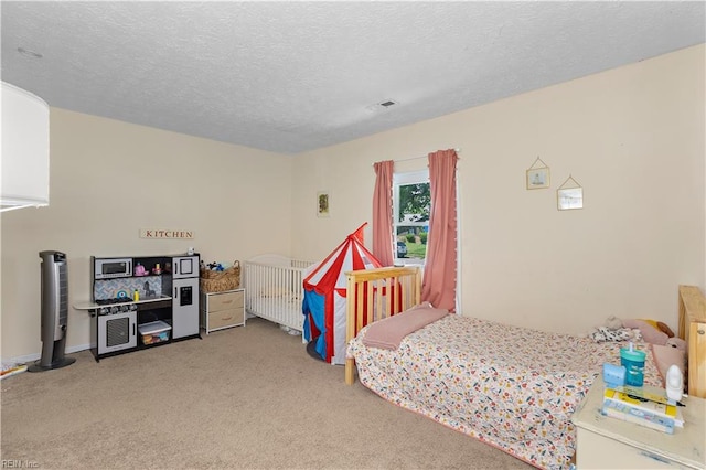 3009 Aaron Dr, Chesapeake, VA 23323 - bedroom featuring carpet and a textured ceiling