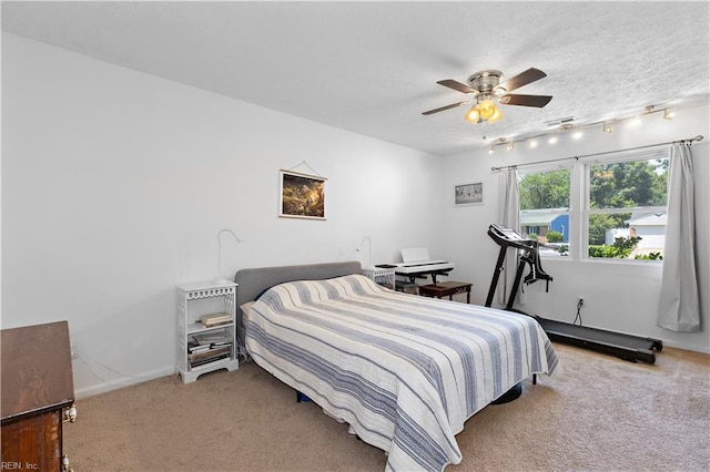 3009 Aaron Dr, Chesapeake, VA 23323 - bedroom with carpet, track lighting, and ceiling fan