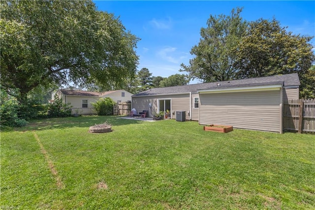 3009 Aaron Dr, Chesapeake, VA 23323 - rear view of property with a fire pit