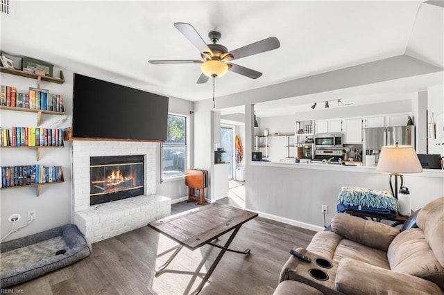 1536 Eagleton Ln, Virginia Beach, VA 23455 - living area featuring dark wood-style floors, ceiling fan, and a fireplace