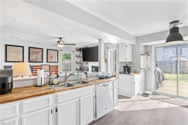 1536 Eagleton Ln, Virginia Beach, VA 23455 - kitchen with white dishwasher, white cabinetry, butcher block counters, and ceiling fan