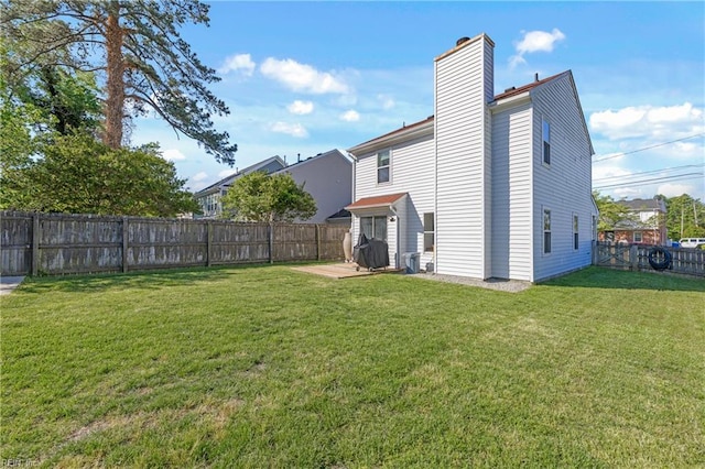 1536 Eagleton Ln, Virginia Beach, VA 23455 - back of property with a fenced backyard and a chimney