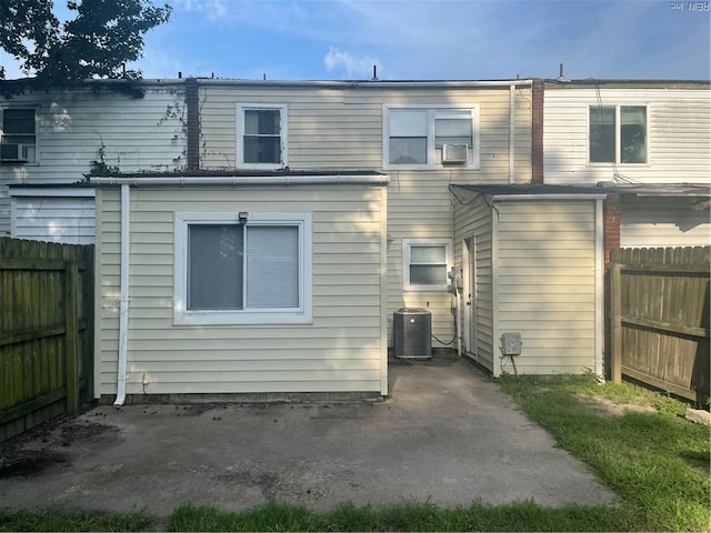 1122 Old Clubhouse Rd, Virginia Beach, VA 23453 - rear view of house with a patio, a fenced backyard, and cooling unit