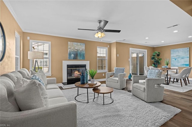 5001 Heathglen Cir, Virginia Beach, VA 23456 - living room with ornamental molding, wood finished floors, recessed lighting, ceiling fan, and a glass covered fireplace