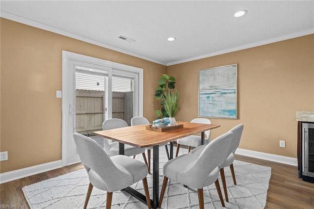 5001 Heathglen Cir, Virginia Beach, VA 23456 - dining area featuring ornamental molding, recessed lighting, and dark wood-style floors