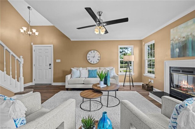 5001 Heathglen Cir, Virginia Beach, VA 23456 - living room with wood finished floors, stairs, a glass covered fireplace, a chandelier, and ceiling fan