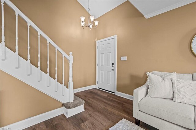 5001 Heathglen Cir, Virginia Beach, VA 23456 - entryway with stairs, wood finished floors, a chandelier, ornamental molding, and a high ceiling