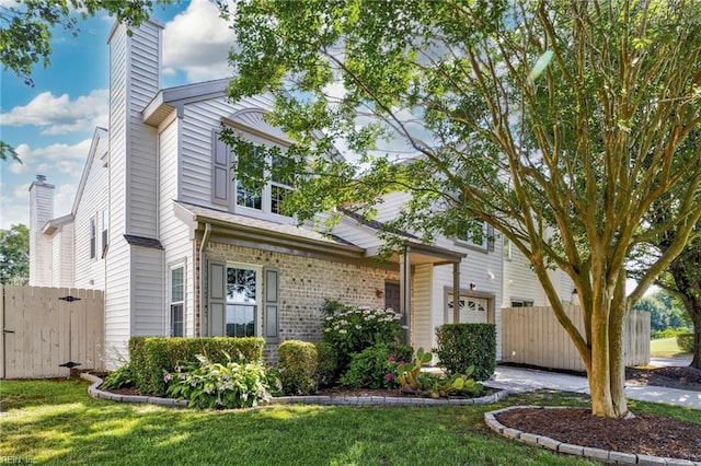 5001 Heathglen Cir, Virginia Beach, VA 23456 - view of front of property with a chimney and brick siding