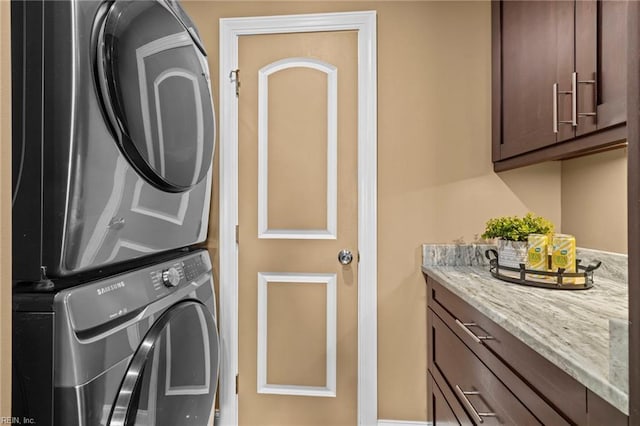 5001 Heathglen Cir, Virginia Beach, VA 23456 - laundry room featuring stacked washing machine and dryer and cabinet space