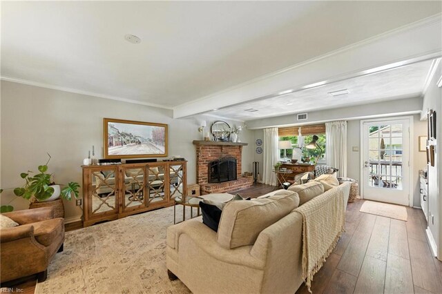 4704 Haygood Point Rd, Virginia Beach, VA 23455 - living area with hardwood / wood-style floors, a brick fireplace, and ornamental molding