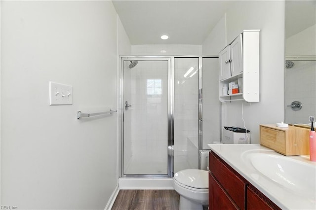 622 Jessica Cir Unit 21, Newport News, VA 23606 - bathroom with vanity, a stall shower, and wood finished floors
