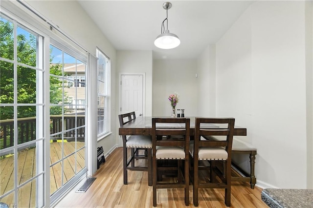 622 Jessica Cir Unit 21, Newport News, VA 23606 - dining area featuring light wood-type flooring and baseboards