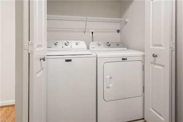 3842 Sir Francis Drake Dr, Chesapeake, VA 23321 - washroom with independent washer and dryer and light wood-style flooring