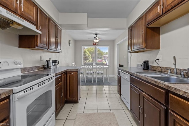 4715 Donelson Rd, Virginia Beach, VA 23455 - kitchen featuring white appliances, under cabinet range hood, ceiling fan, light tile patterned floors, and dark countertops