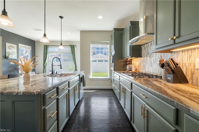 1665 Teton Ct, Chesapeake, VA 23320 - kitchen featuring wall chimney exhaust hood, stainless steel appliances, tasteful backsplash, dark stone counters, and recessed lighting
