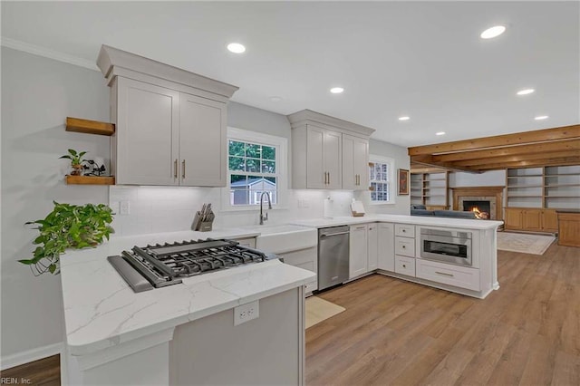23 Paula Maria Dr, Newport News, VA 23606 - kitchen featuring stainless steel dishwasher, a peninsula, open shelves, cooktop, and recessed lighting