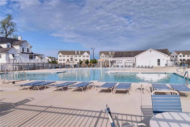 3472 Westham Ln, Toano, VA 23168 - community pool featuring a residential view and a patio