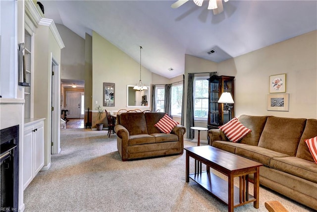 601 Commons Way, Williamsburg, VA 23185 - living room with light carpet, ceiling fan, a chandelier, and high vaulted ceiling