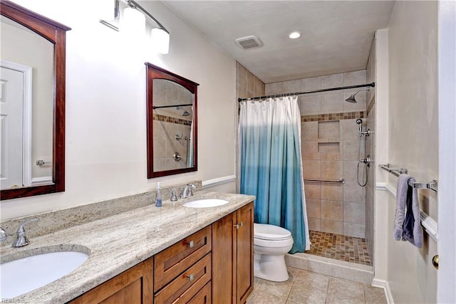 601 Commons Way, Williamsburg, VA 23185 - bathroom with a tile shower, double vanity, tile patterned flooring, and recessed lighting