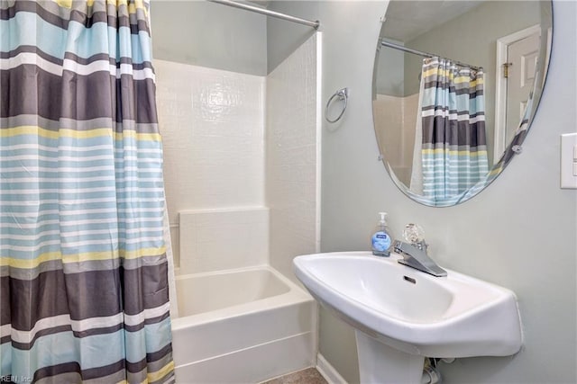 601 Commons Way, Williamsburg, VA 23185 - bathroom with shower / bathtub combination with curtain and a sink