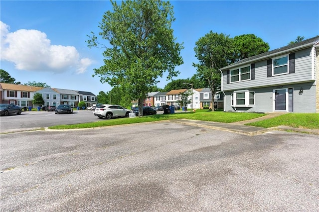 3725 Kingsmill Walk, Virginia Beach, VA 23452 - view of asphalt road with a residential view, curbs, sidewalks, and street lighting