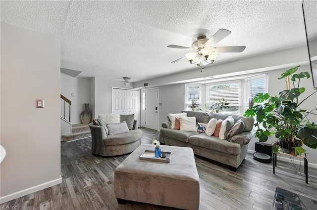 3725 Kingsmill Walk, Virginia Beach, VA 23452 - living area featuring a textured ceiling, a ceiling fan, wood finished floors, and stairs