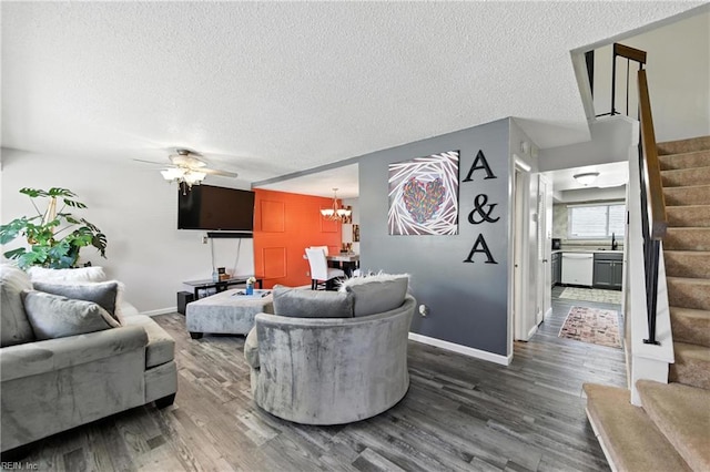 3725 Kingsmill Walk, Virginia Beach, VA 23452 - living room featuring stairs, a ceiling fan, wood finished floors, a chandelier, and a textured ceiling
