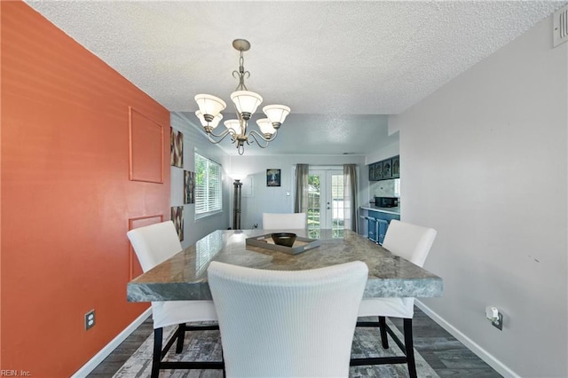 3725 Kingsmill Walk, Virginia Beach, VA 23452 - dining area featuring dark wood finished floors, a chandelier, and a textured ceiling
