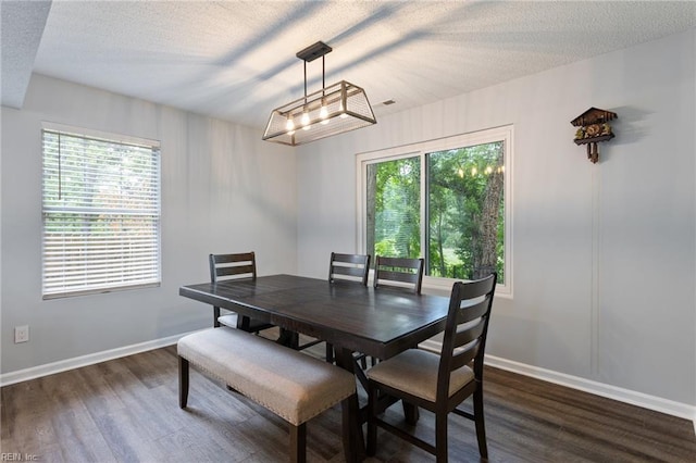 1504 River Creek Cres, Suffolk, VA 23434 - dining area featuring dark wood-style flooring and a textured ceiling