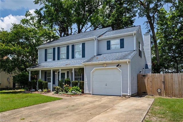1504 River Creek Cres, Suffolk, VA 23434 - view of front of house featuring a porch, a chimney, concrete driveway, an attached garage, and a gate