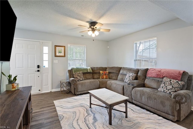 1504 River Creek Cres, Suffolk, VA 23434 - living area with a ceiling fan, wood finished floors, and a textured ceiling