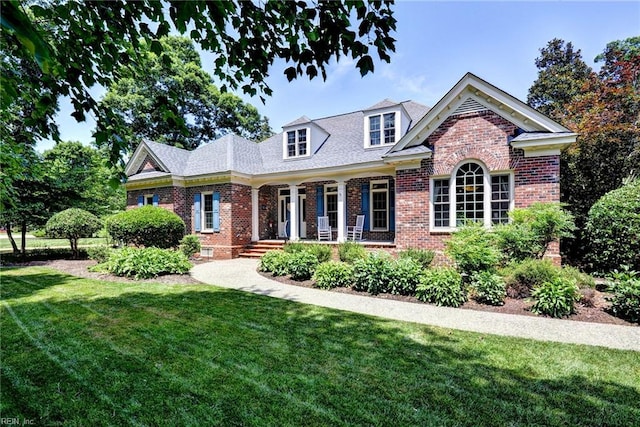 2093 Harpers Ml, Williamsburg, VA 23185 - view of front of home featuring brick siding and a front lawn