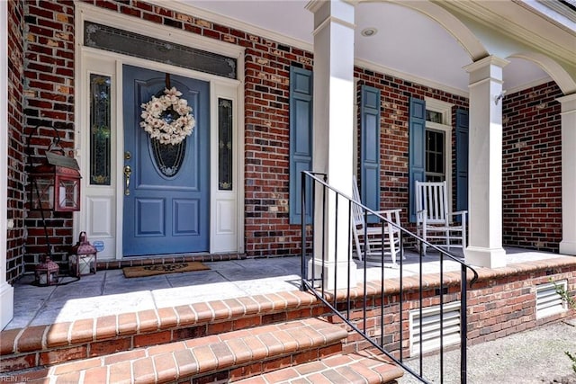 2093 Harpers Ml, Williamsburg, VA 23185 - doorway to property with covered porch and brick siding