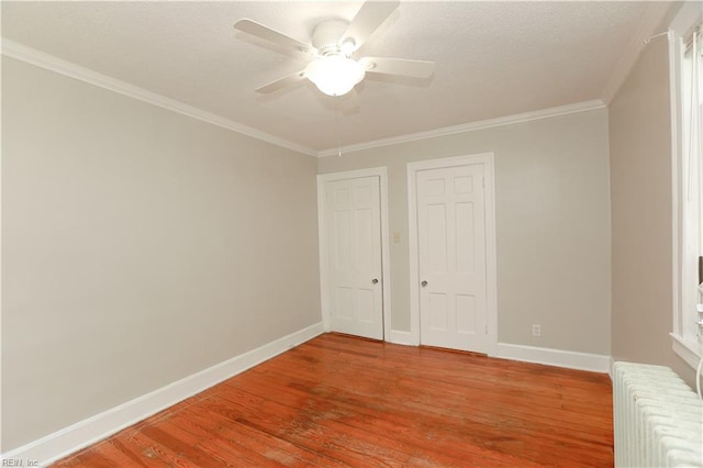 308 River Rd, Newport News, VA 23601 - unfurnished bedroom featuring light wood-type flooring, ornamental molding, a ceiling fan, and radiator heating unit