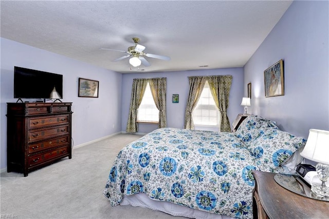 3284 Reades Way, Williamsburg, VA 23185 - carpeted bedroom featuring a ceiling fan and a textured ceiling
