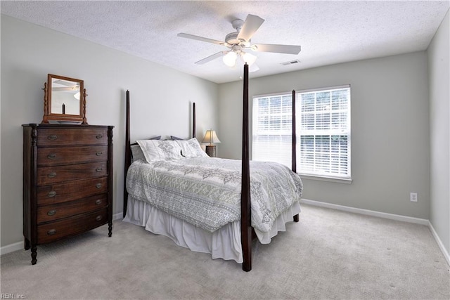 3284 Reades Way, Williamsburg, VA 23185 - bedroom featuring light carpet, a textured ceiling, and a ceiling fan