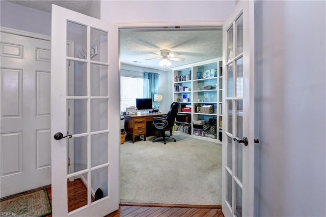 3284 Reades Way, Williamsburg, VA 23185 - home office with french doors, a textured ceiling, and ceiling fan
