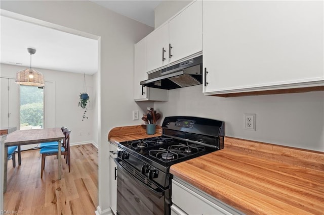701 Hecate Dr, Virginia Beach, VA 23454 - kitchen featuring black range with gas cooktop, under cabinet range hood, white cabinets, light wood-style floors, and hanging light fixtures