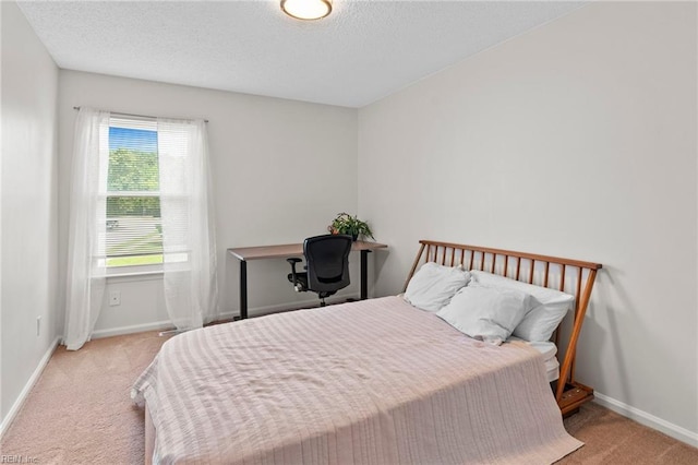 701 Hecate Dr, Virginia Beach, VA 23454 - carpeted bedroom featuring a textured ceiling and baseboards