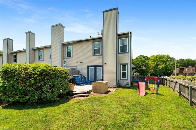 701 Hecate Dr, Virginia Beach, VA 23454 - rear view of house featuring a wooden deck and a chimney