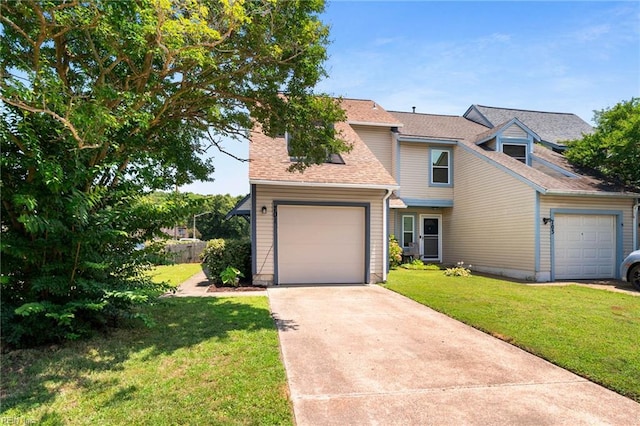 701 Hecate Dr, Virginia Beach, VA 23454 - view of front of house with a front yard, driveway, and a shingled roof