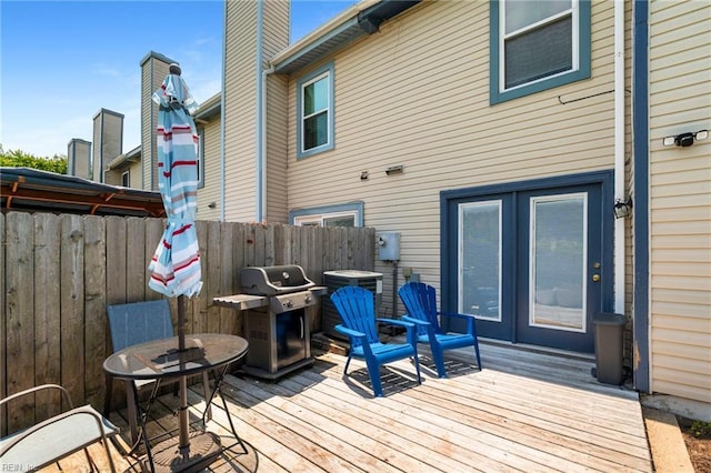 701 Hecate Dr, Virginia Beach, VA 23454 - wooden terrace with area for grilling and french doors