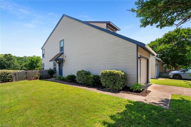 701 Hecate Dr, Virginia Beach, VA 23454 - view of side of home featuring an attached garage and driveway