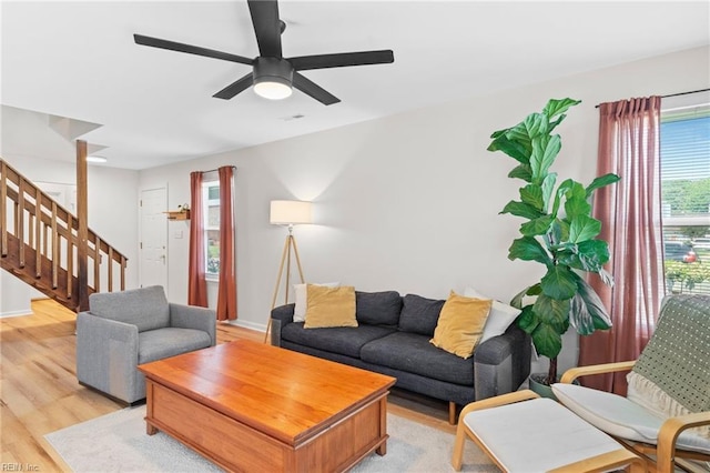 701 Hecate Dr, Virginia Beach, VA 23454 - living area with stairway, wood finished floors, and a ceiling fan