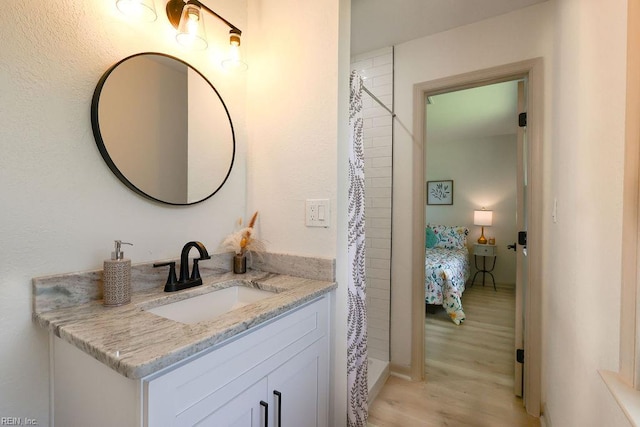 552 Boxwood Ln, Virginia Beach, VA 23452 - full bath with vanity, wood finished floors, and a shower with curtain